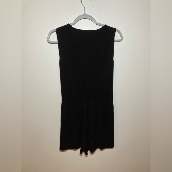 BCBGeneration V-neck Surplice Romper in Black. Size Small. - Picture 10 of 11